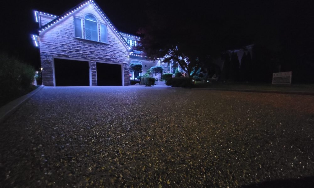 after sealed exposed aggregate driveway night