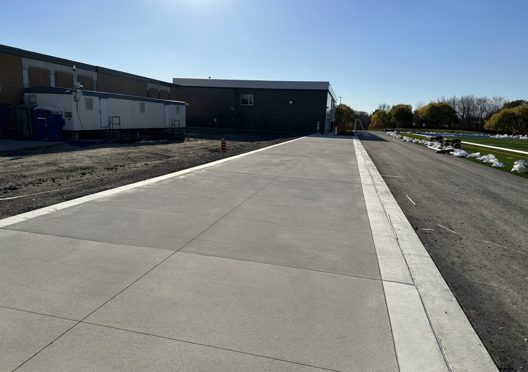 Concrete installation bleachers pad